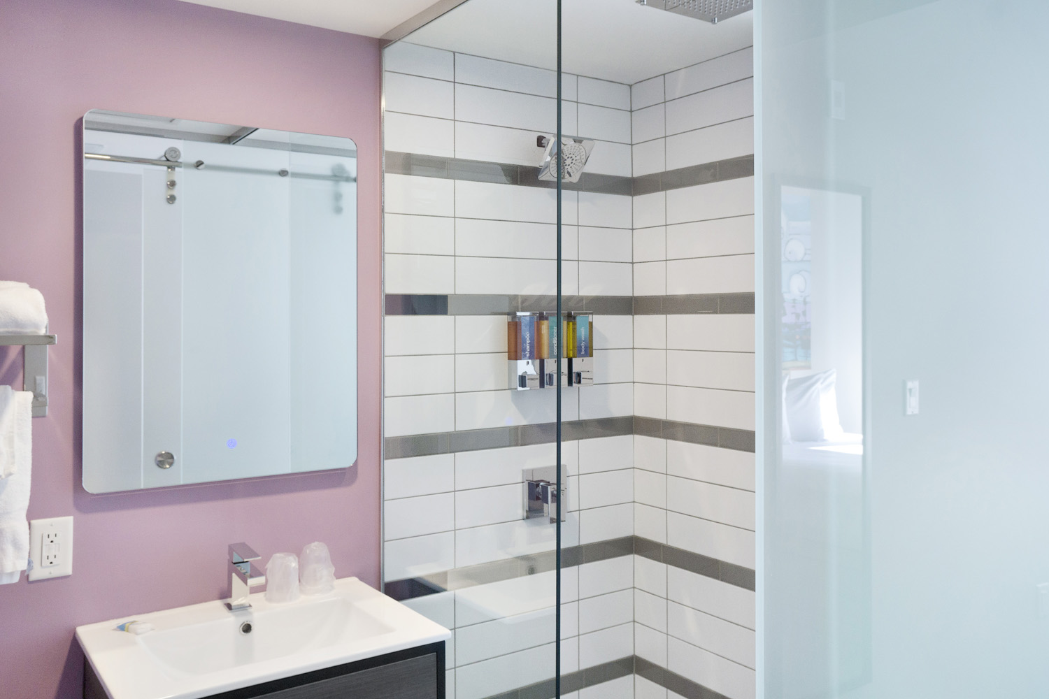 Bathroom with pink accent wall
