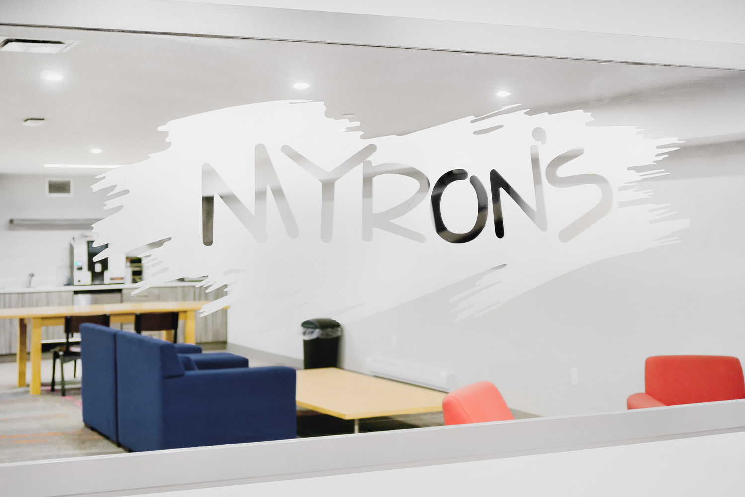 Etched Myron's signage